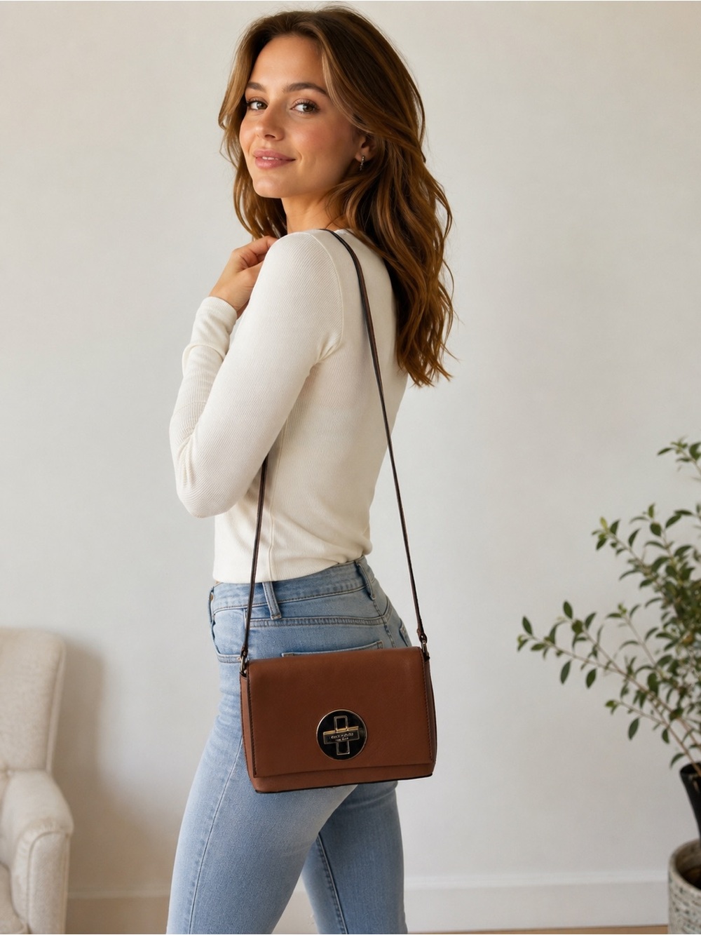 kate spade brown leather crossbody with gold medallion